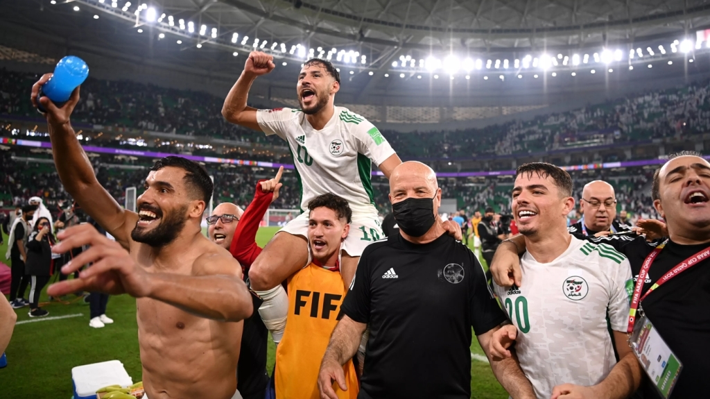 Mohammed-Belaili-of-Algeria-is-carried-by-Aimen-Bouguerra-as-he-celebrates-with-teammates